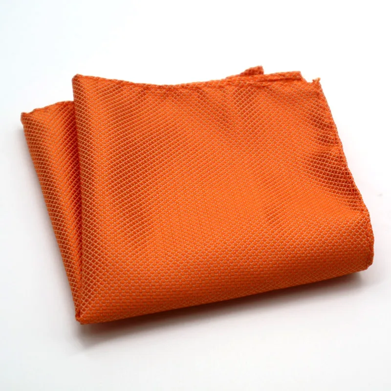 serviette orange pliée